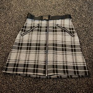 Black and white plaid zip up skirt with attached buckle belt
